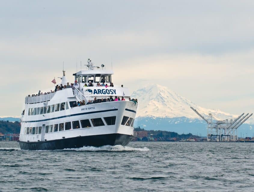 Photo of Mount Baker behind an Argosy vessel one of their many Seattle local cruises.
