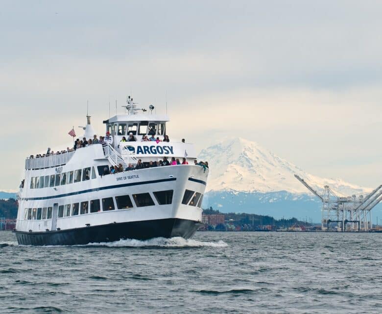 Photo of Mount Baker behind an Argosy vessel one of their many Seattle local cruises.