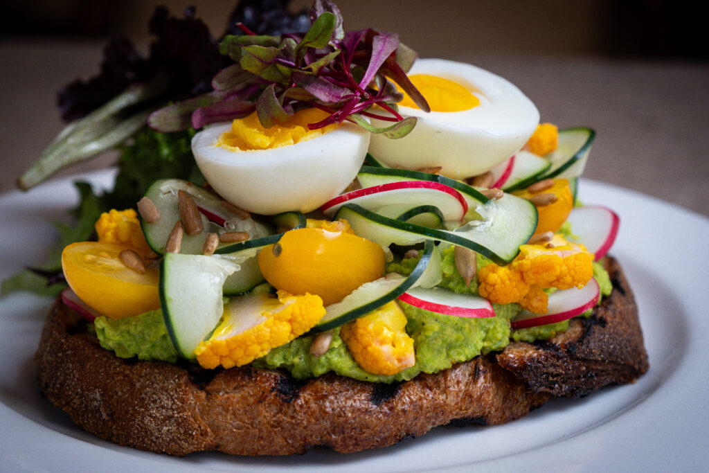 Hummus Breakfast Toast from Oliver's Sunday Brunch Menu.